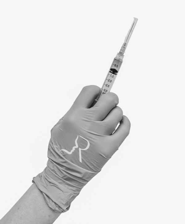 hand holding syringe